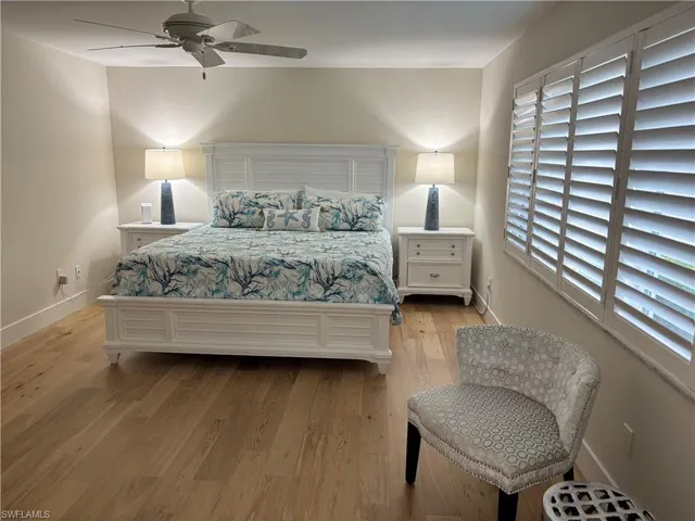 Bedroom featuring light wood-style flooring and ceiling fan