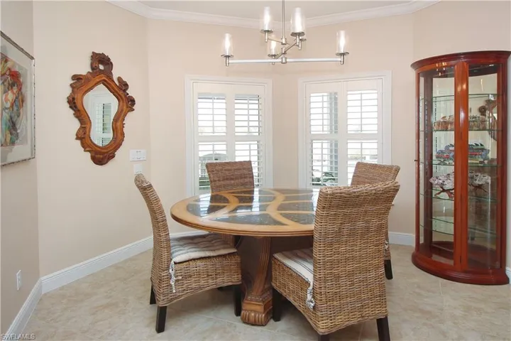 Dining Area with crown molding