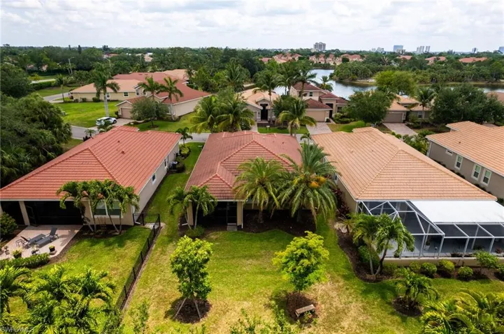 Aerial view of residential area with a nearby body of water