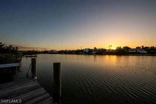 Dock featuring a water view