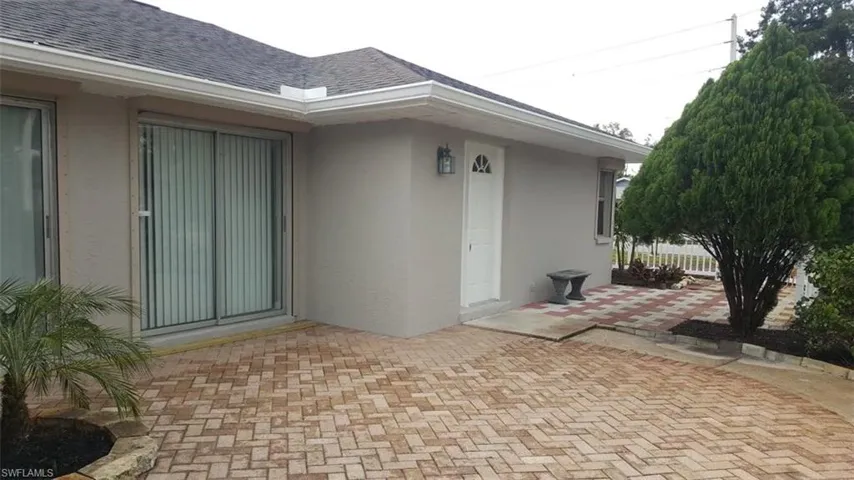 Entrance to property with a patio