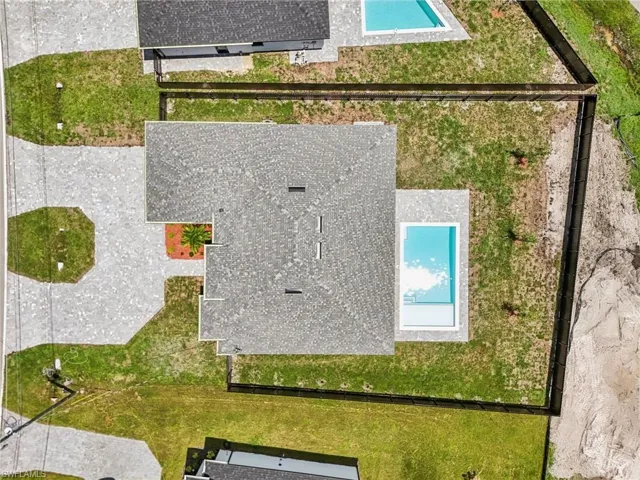 Drone / aerial view of a pool area