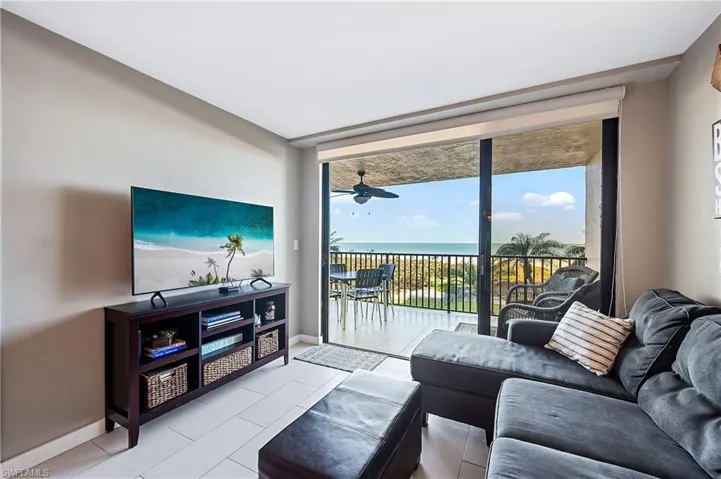 Living room with impact sliders to lanai