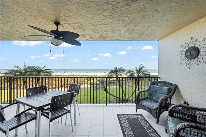 Beach, water and palm trees are all yours to view