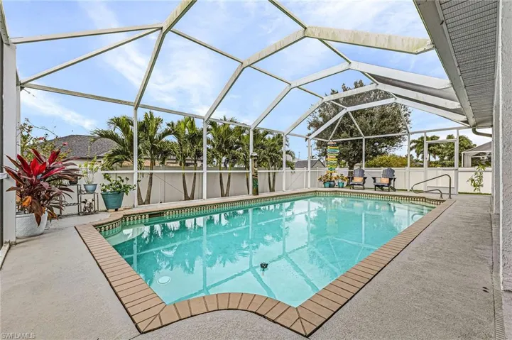 View of pool with a fenced backyard