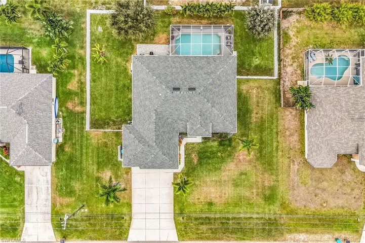 View from above of property featuring a pool