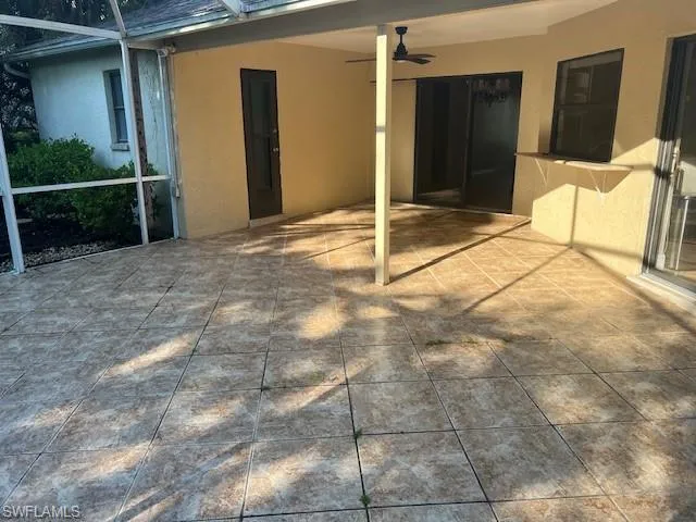 View of patio featuring ceiling fan