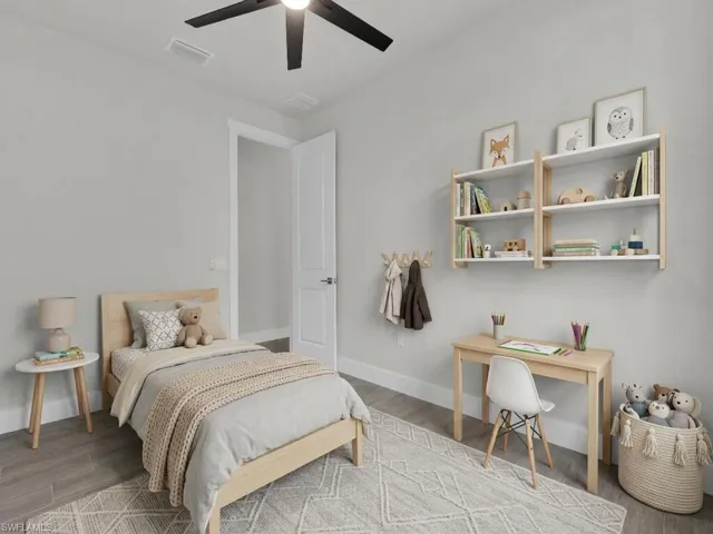 Bedroom featuring light wood-style flooring and ceiling fan