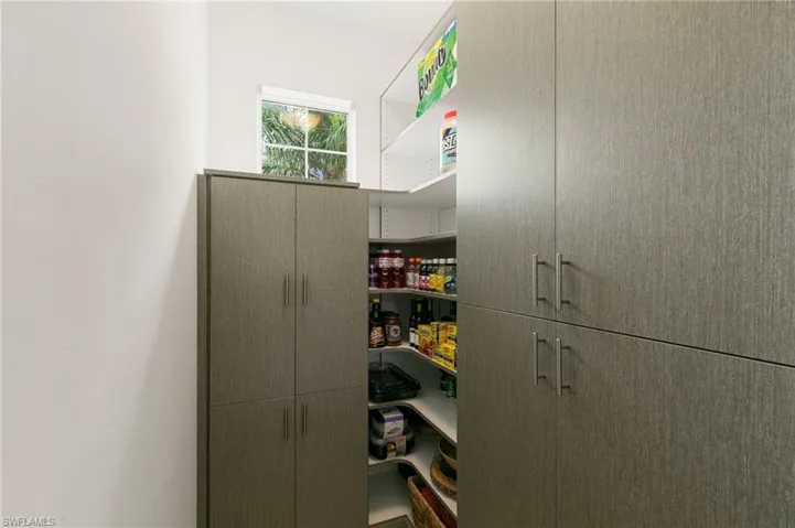 Walk-In Pantry features Custom designed Built In's will meet all of your storage needs!