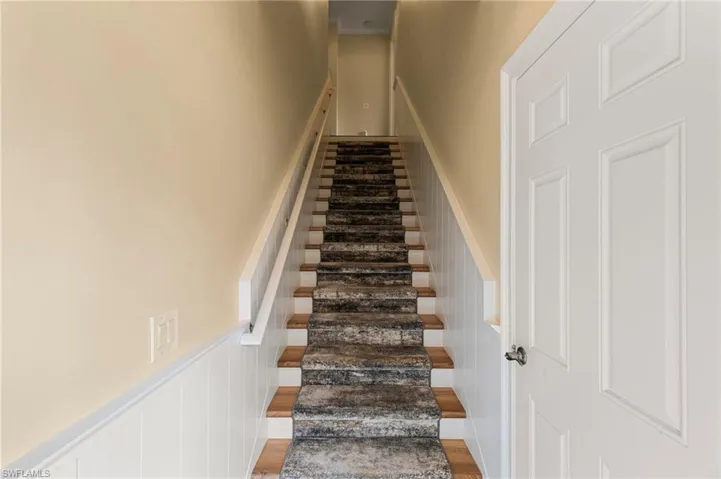 Custom Millwork and warm wood flooring greets you upon entry into the Home.