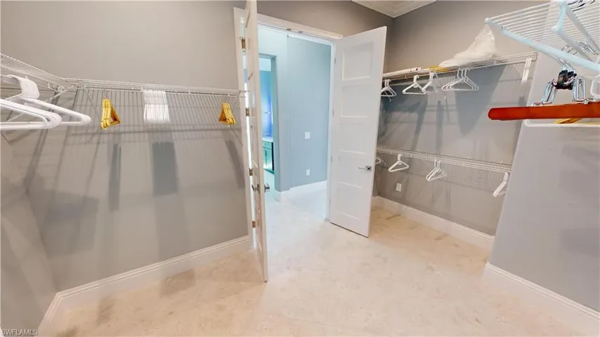 Primary Closet has entrance from laundry as well as Bedroom