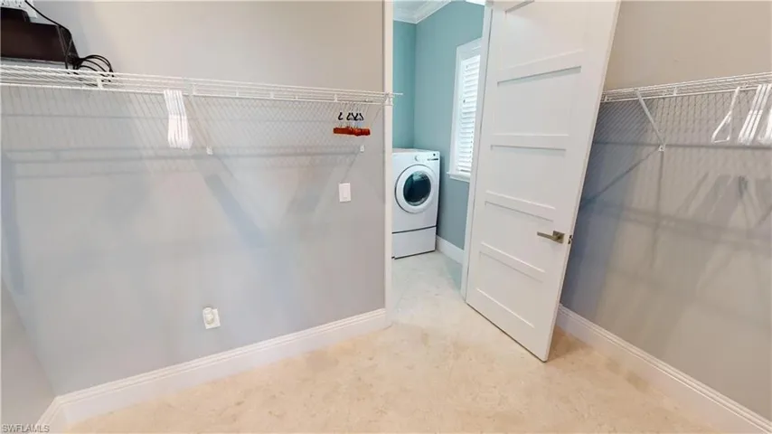 Primary Closet has entrance from laundry as well as Bedroom