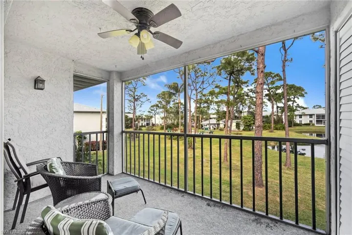 Sunroom featuring ceiling fan