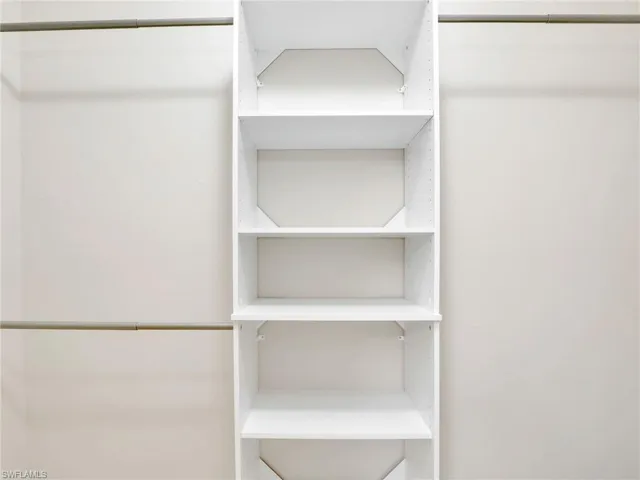 Walk-in Closet w/ Built-in Shelving