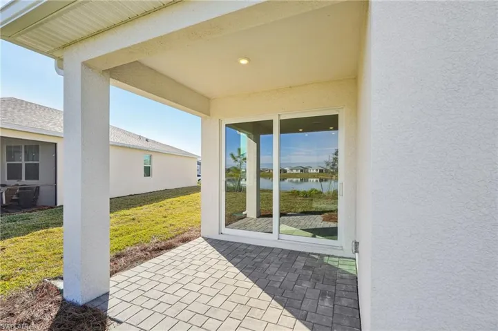 View of patio / terrace featuring a water view