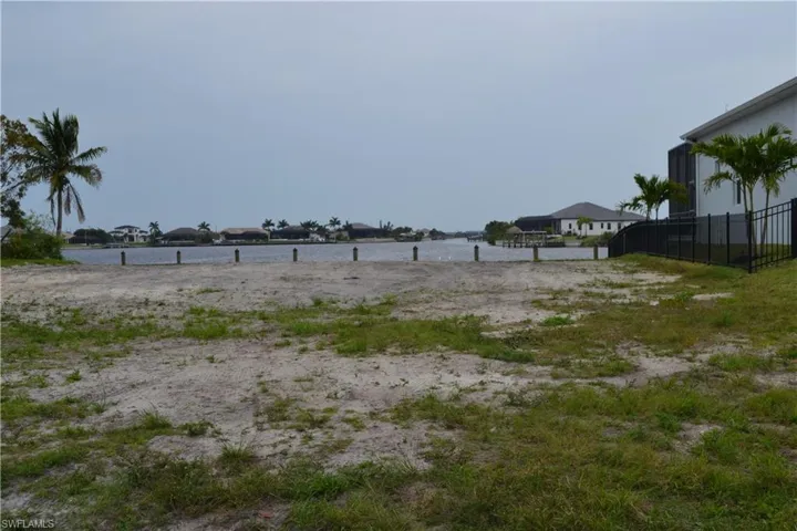 View of yard with a water view