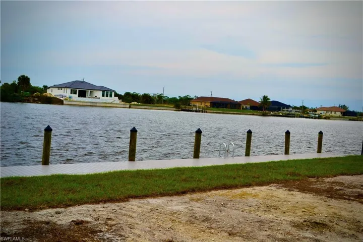 Water view with a boat dock