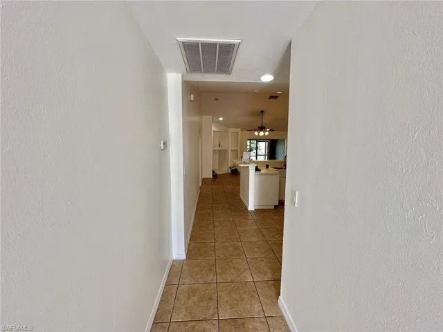 4317 view of entryway from front door and third bedroom / den/office doorway to left