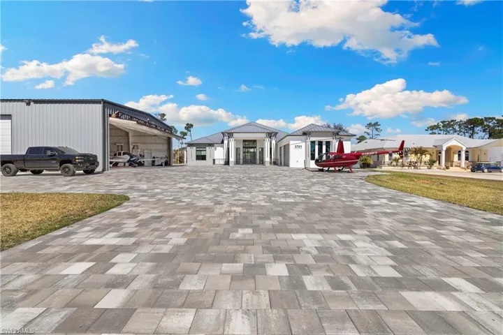 View of front of property featuring driveway