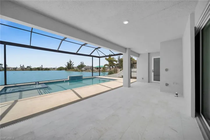 Pool featuring a patio and a lanai
