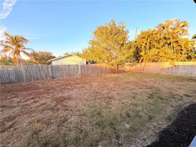 View of fenced backyard