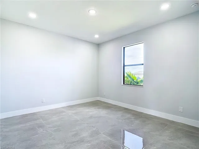 Unfurnished room featuring tile flooring