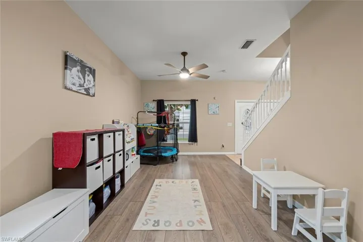 Living room space that can be used as a formal living room, game room, office, or play room