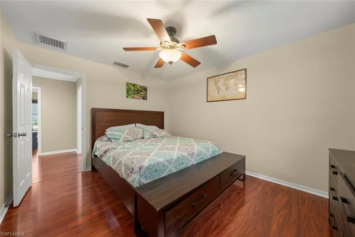 Bedroom featuring laminate flooring and ceiling fan