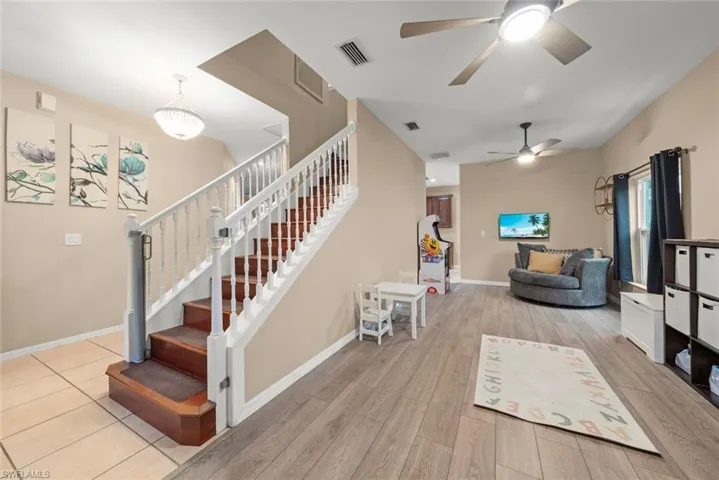 Living room space that can be used as a formal living room, game room, office, or play room