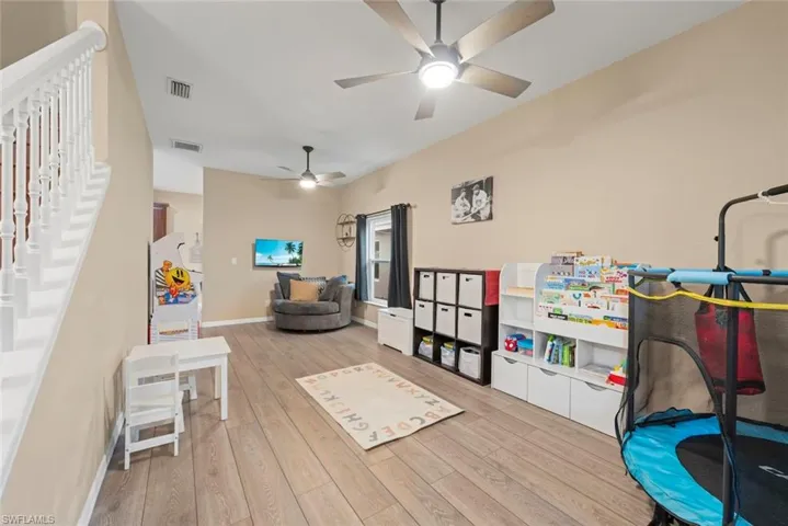 Living room space that can be used as a formal living room, game room, office, or play room