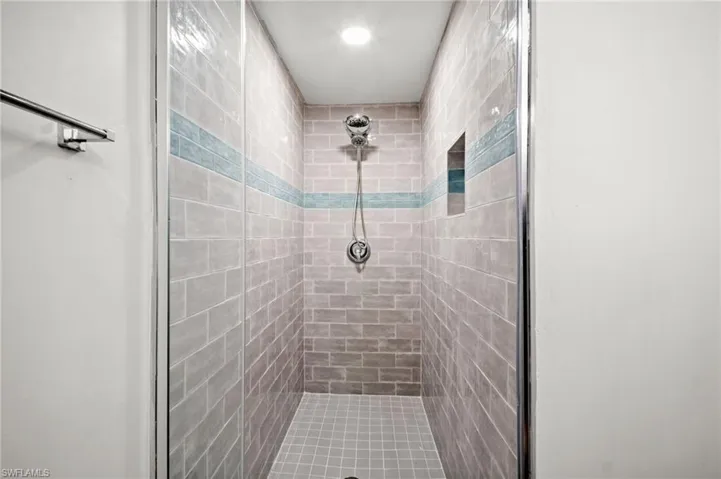 Bathroom featuring a shower stall