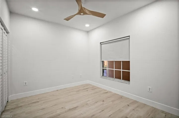 Unfurnished room featuring light wood-style flooring, recessed lighting, and ceiling fan