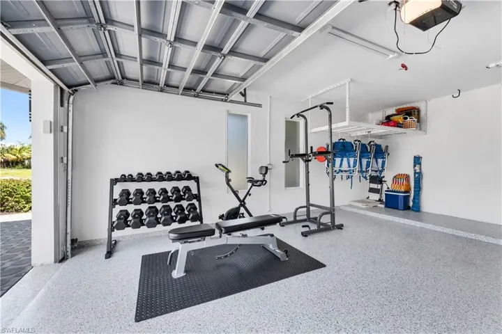 Workout room with a garage