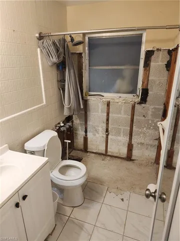 Bathroom with vanity and toilet