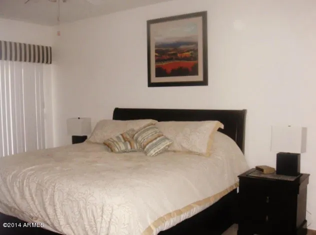 King bed [linens provided], flat-screen TV, en suite