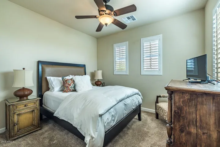Guest bedroom with Queen bed and TV