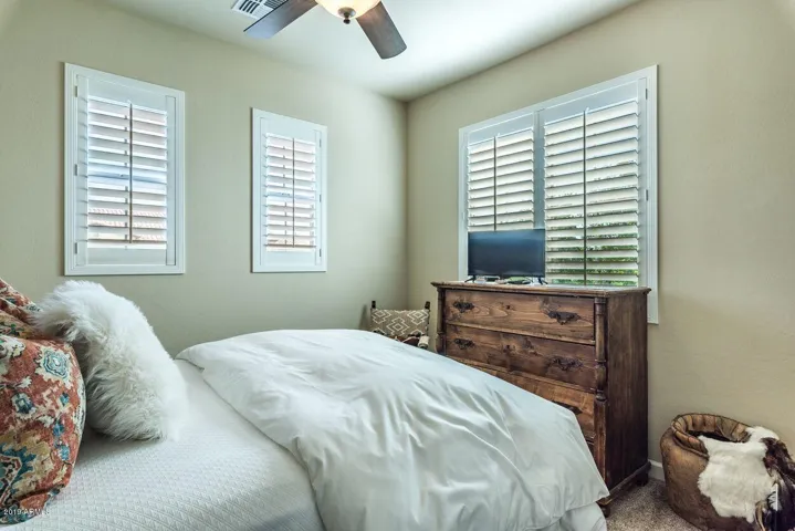 Guest bedroom with Queen bed and TV