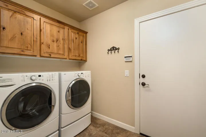 Direct access from 2 car garage into spacious laundry room
