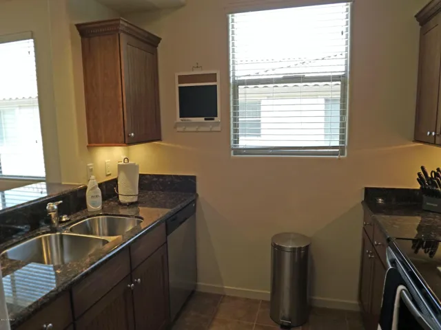 Kitchen area also has natural light.