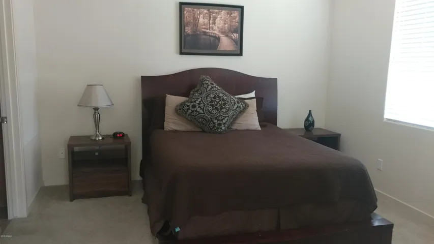 Master bedroom with queen bed