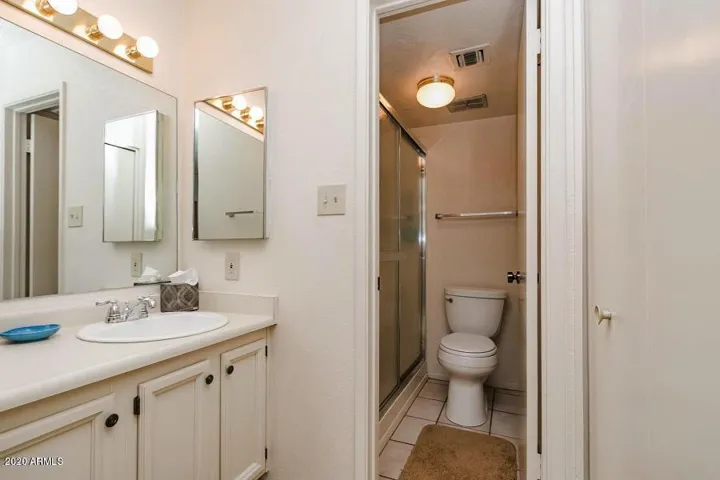 Bath with tub/shower within bedroom
