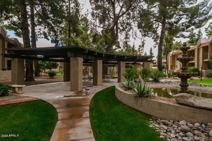 Walk way to heated pool, hot tub and clubhouse that offer several amenities.