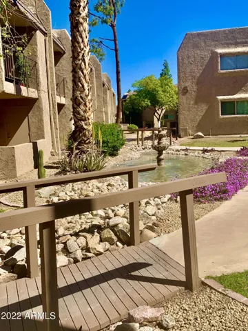 View from covered balcony, enjoy the ambiance of the fountains throughout the complex.
