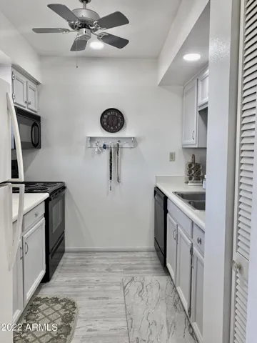 Kitchen, fully furnished and offers pantry space
