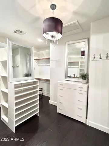 Upstairs owners walk in closet