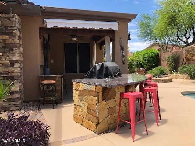 Built-In BBQ Island with Bar Seating