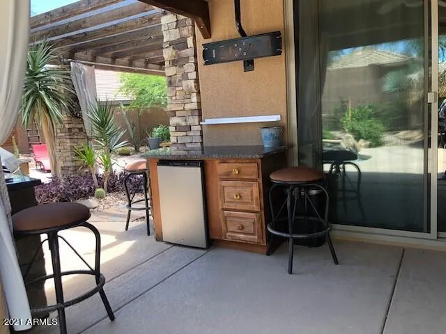 Covered Patio with Built-In BBQ and Kitchen Island