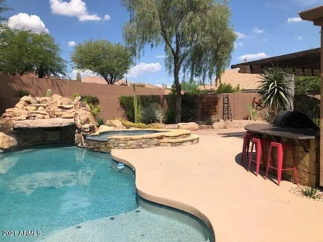 Pool, Grotto, Spa, BBQ Island and Lots of Sun and Shade Living Space