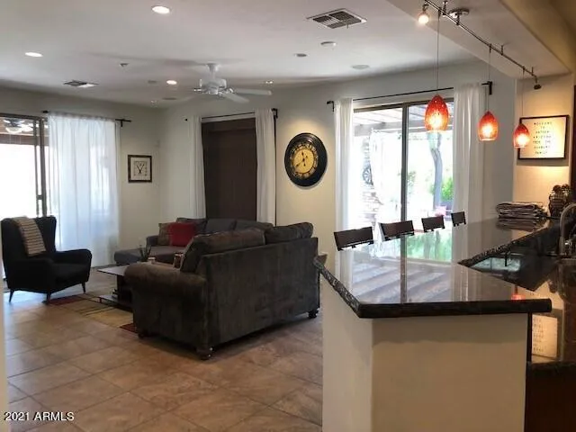 Kitchen with Breakfast Bar and View to Great Room
