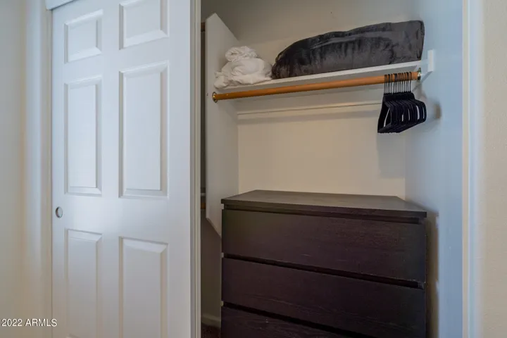 Dresser, extra bedding +plenty of hangers throughout